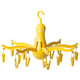 Bright yellow PRESSA dryer with 16 pegs, octopus-like design, hangs anywhere.