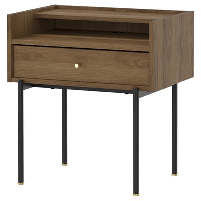 The RÅDMANSÖ bedside table warm walnut tones, a single drawer, and an open shelf, supported by black metal legs.
