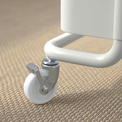 A close-up of a white trolley wheel with a metal handle on a woven floor. High-quality castor for stability.