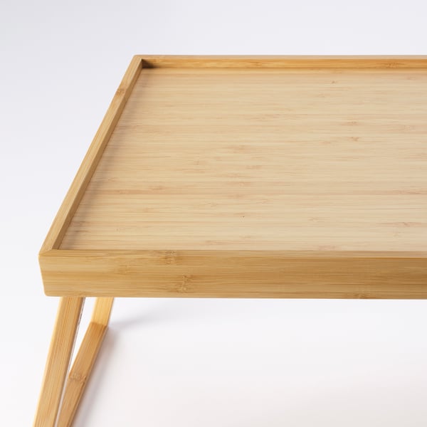 Smooth bamboo bed tray, light wood finish, foldable legs for easy storage.