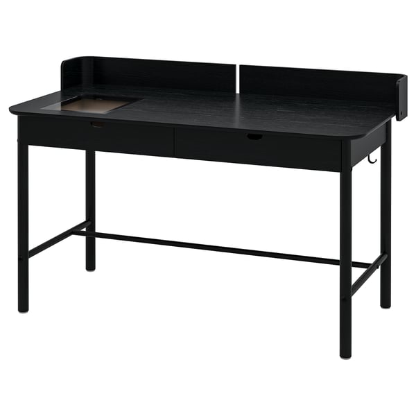 A black RIDSPÖ desk with a curved shield, two drawers, and a glass-topped drawer. Modern, functional design in black.