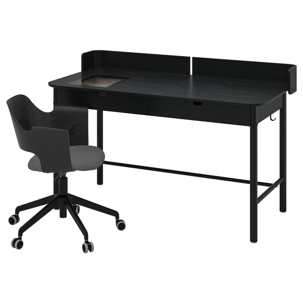Black RIDSPÖ desk and fjällberget chair. Desk has drawers and a shield. Chair has a curved back and wheels.
