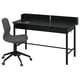 Black modern desk and gray chair. Desk has drawers and back panel. Chair swivels and tilts. Clean, minimalist design.