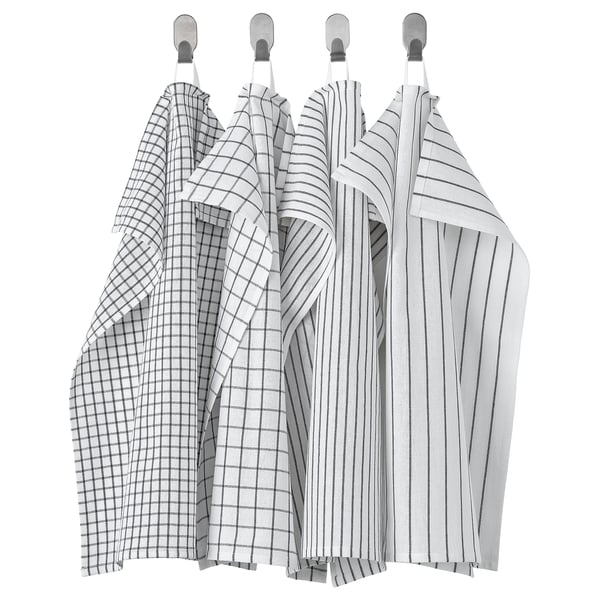 Four grey towels with square and stripe patterns hang neatly, two with checks, two with stripes, all in white and grey cotton.