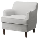 A stylish ROCKSJÖN armchair with a grey striped cover, wooden legs, and plush cushions.