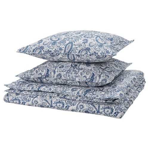 A stack of RODGERSIA bed linens in blue and white paisley pattern, featuring cotton and viscose blend, with a soft, decorative button closure.