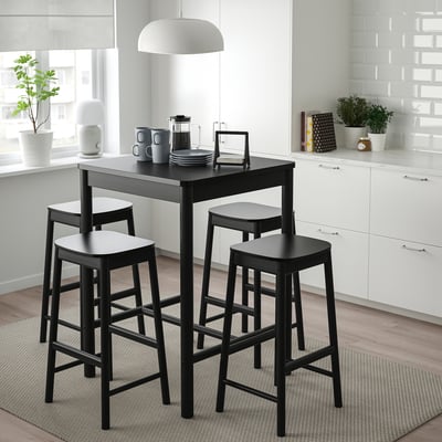 Small black RÖNNINGE 4-seat dining set fits cosy spaces.