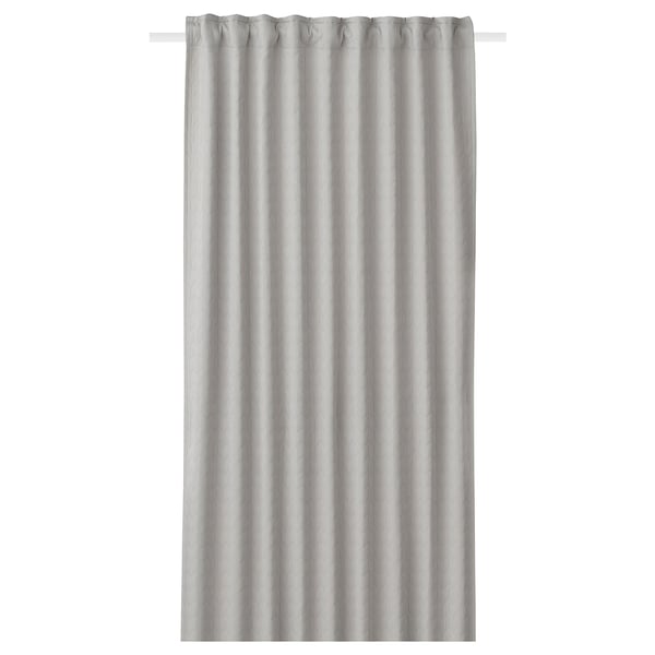 A single white RYSSBRÄKEN curtain with a textured pattern, hanging straight.