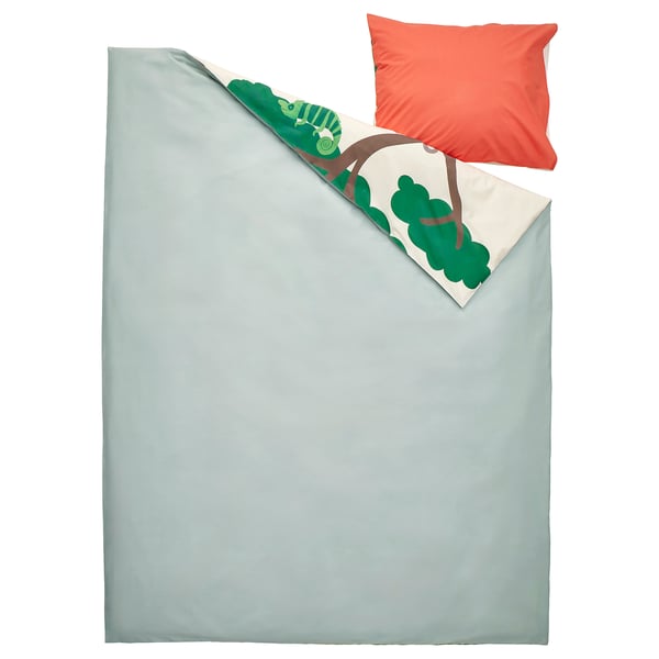 SANDLÖPARE bedding set: light blue, green savannah design, 100% cotton, rectangular, with red pillow.