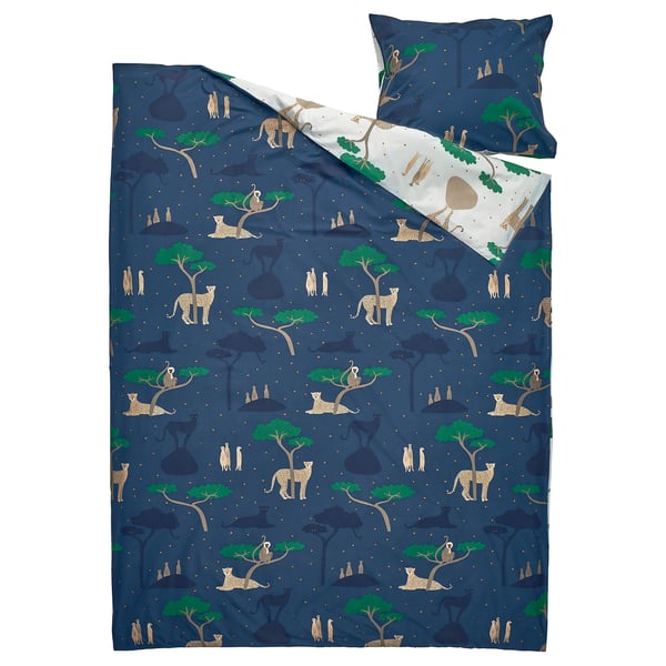 SANDLÖPARE duvet cover set with cheetah patterns; navy colour; cotton and viscose; featuring daytime and nighttime scenes.