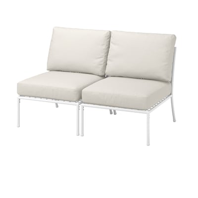 The SEGERÖN outdoor lounge chair in white with beige cushions, made from steel and polyester.
