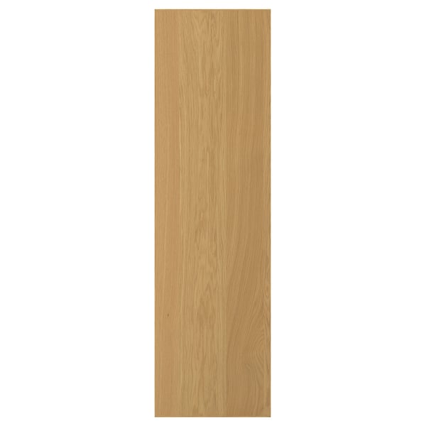 A SINARP door in light oak wood. Its rectangular with a smooth veneer finish. A solid oak edge adds stability and durability.