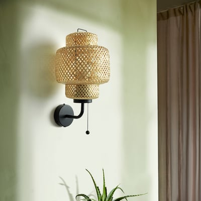 SINNERLIG wall lamp with bamboo shade, warm glow, perfect for small spaces.