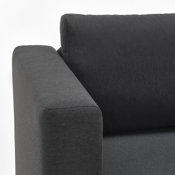 Dark grey sofa with smooth fabric, neat stitching, and clean, modern lines. Perfect for comfort and style.