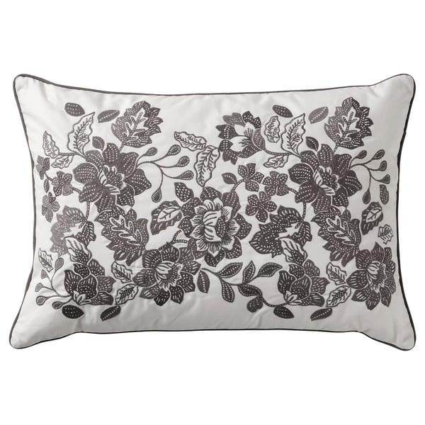 SKUGGNÄVA pillow: grey embroidered floral cotton, rectangular shape.
