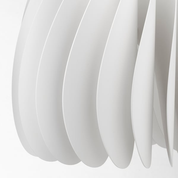 Modern pendant lamp with curved, white recycled plastic panels. Elegantly diffuses light.