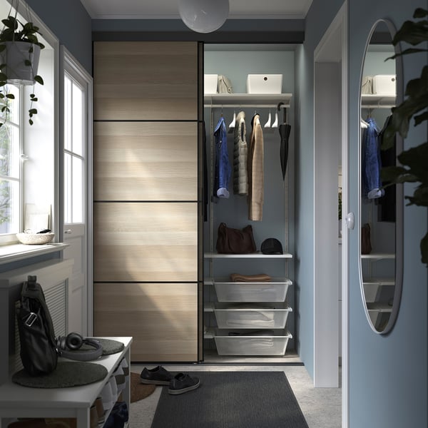 Modern bedroom corner wardrobe with custom storage & mirror