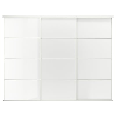 A white SKYTTA sliding door system with glass panels. It an aluminium frame and minimalist design.