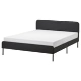 Modern black bed with upholstered headboard