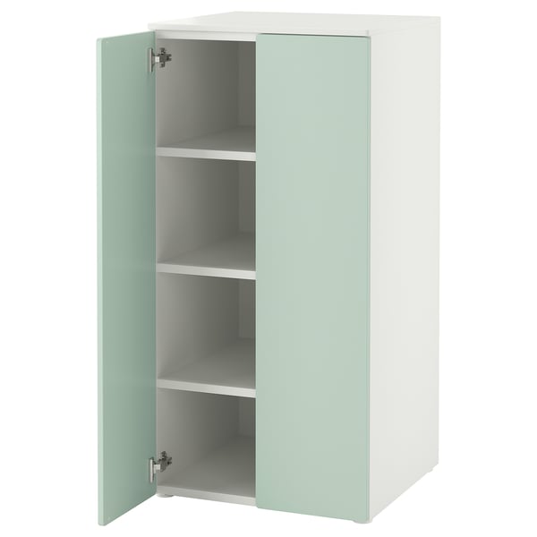 Small white and light green kids cabinet with 3 shelves, soft-close doors.