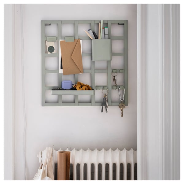 SNICKRA storage board in grey, holds keys, notes, & pens, mounted on wall, includes clips & hooks, metal & plastic materials.