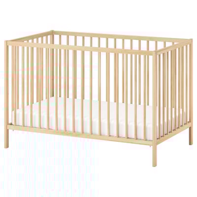 SNIGLAR: light wooden baby crib with light mattress, rectangular shape.