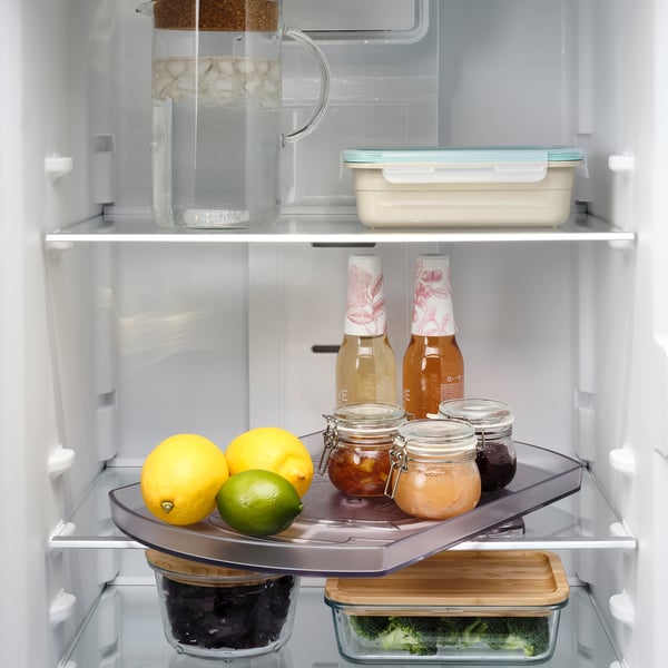 Fridge organiser spins, pulls out, labs help see, reach items.