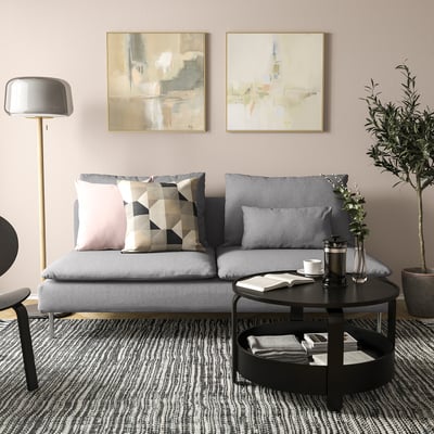 Grey SÖDERHAMN sofa with pillows, art, plant, dark rug