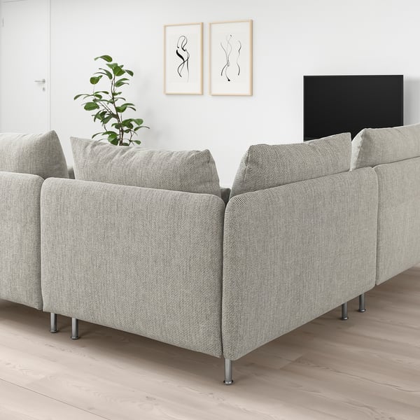 Modern living room with grey SÖDERHAMN sectional sofa, tv, and plant.