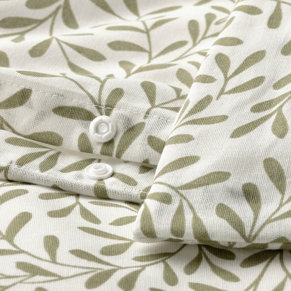 Leaf-patterned duvet cover with recycled cotton and polyester, featuring bottom press-stud closure.