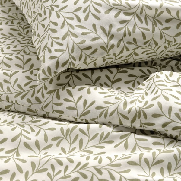 Leaf-patterned bedding set, crease-free, breathable, soft, recycled materials.