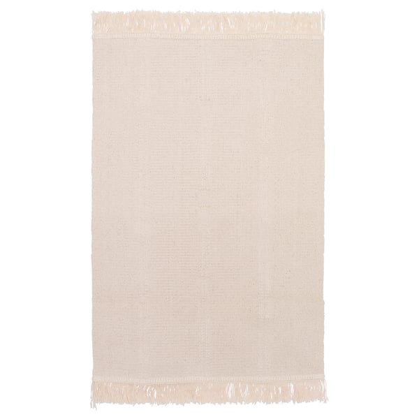 A cream-colored SORTSÖ cotton rug with fringe on both ends.