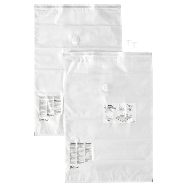 White SPANTAD vacuum bags, flat and sealed, ready for storage.