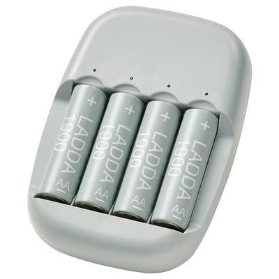 A white STENKOL battery charger with four gray ladda rechargeable batteries.