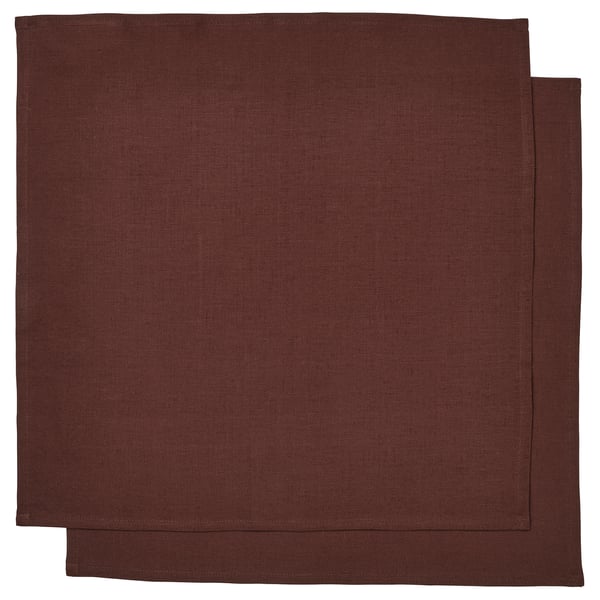 Two dark brown, rectangular linen napkins from the STOCKHOLM 2025 collection, showcasing a natural, textured design.