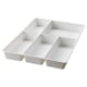 A white STÖDJA drawer organiser made of polypropylene, divided into six compartments.