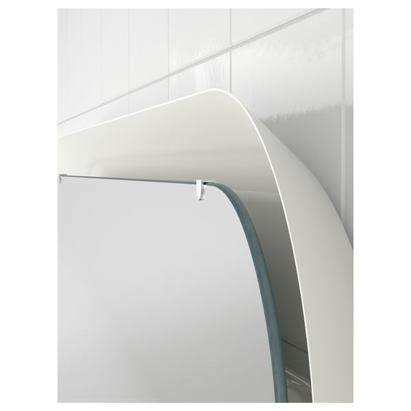 Modern mirror with sleek white frame and integrated led lights, reflecting clean, minimalist decor, ideal for bathrooms.