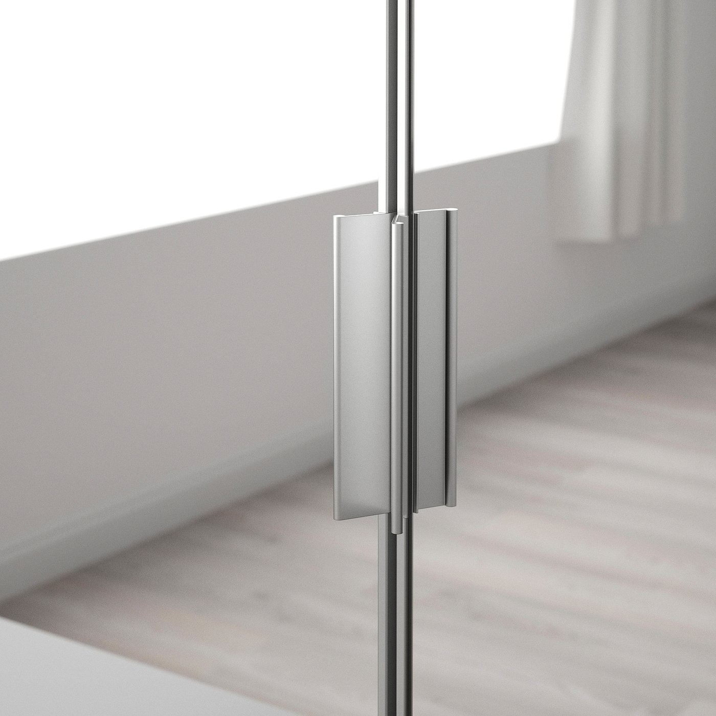 Close-up of sleek, modern metal hinge on mirrored cabinet door.