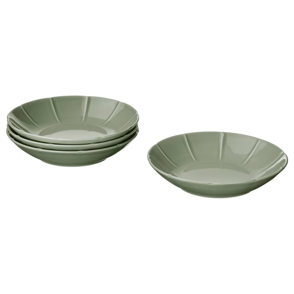 Four green STRIMMIG bowls, two stacked, with subtle flower patterns on stoneware.