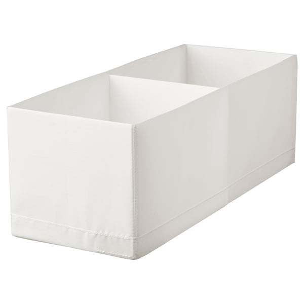 A white STUK storage box, rectangular and made of recycled polyester fabric. It has a plain, simple design with folded edges.