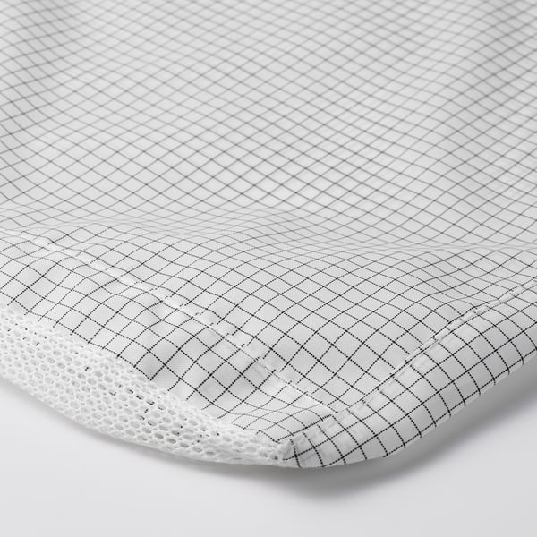 A white, round, mesh-covered cushion with a diamond-patterned fabric surface.