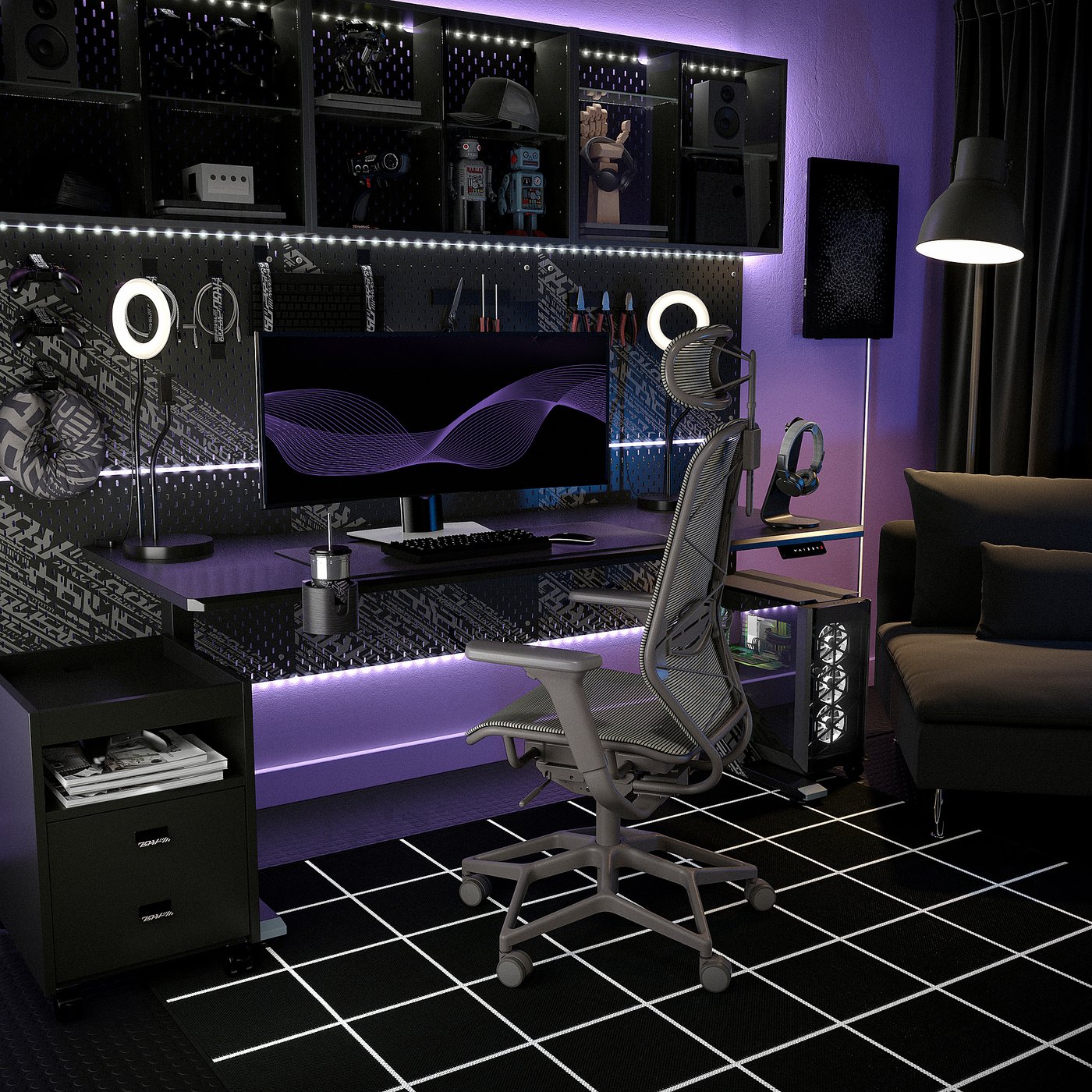 Modern gaming setup with purple lights, STYRSPEL chair, dual monitors, ring lights, and speakers.