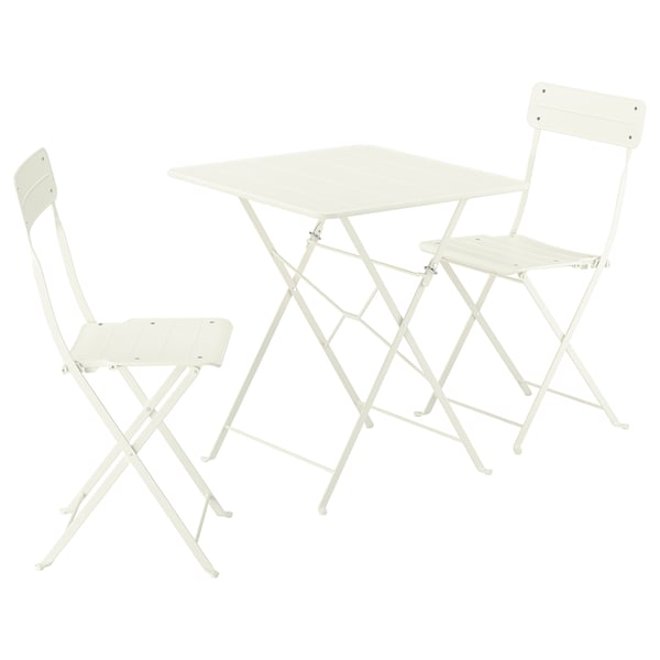A white, foldable outdoor table and two chairs. The set is designed for small spaces and easy storage.