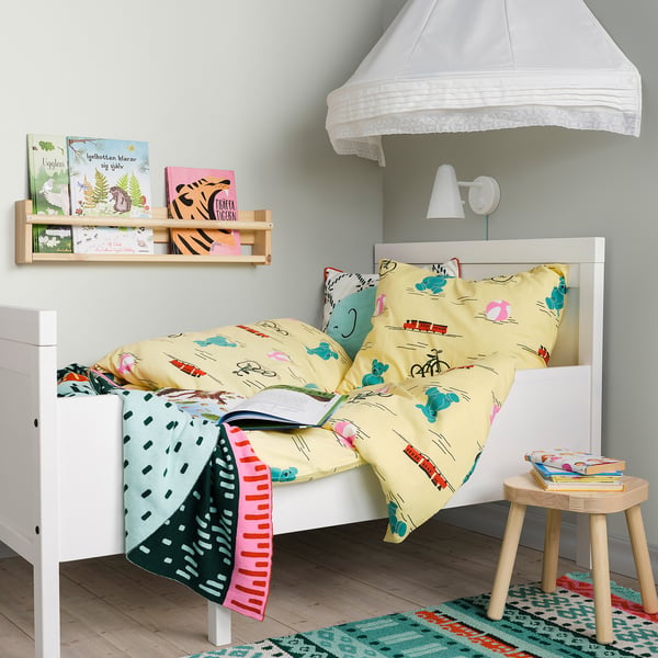 SUNDVIK kids bed, white. Bright, small, cozy. Fit with colorful bedding. A comfy spot in a room with a light, airy feel.