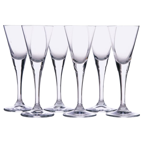 Six clear glass SVALKA wine glasses in classic design, standing upright in a row.