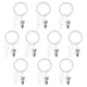 Multiple SYRLIG white curtain rings with hooks and clips arranged neatly.