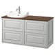 A TÄNNFORSEN light grey bathroom vanity with a wooden countertop and a white ceramic basin. It has multiple drawers for storage.