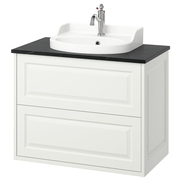 TÄNNFORSEN white wall-mounted vanity with black countertop and round vessel sink.