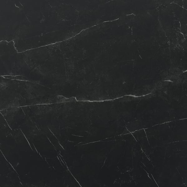 Sleek black TOLKEN countertop with vein patterns, smooth & polished, showcasing durability and elegance.