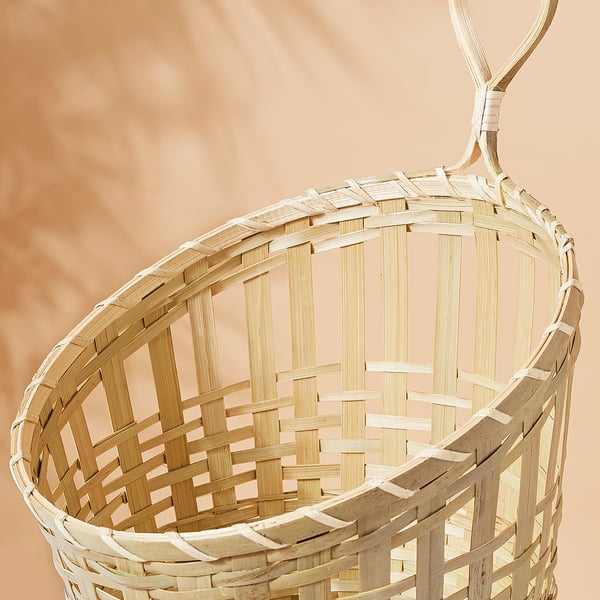 Handwoven bamboo hanging basket, natural, sturdy, eco-friendly design.